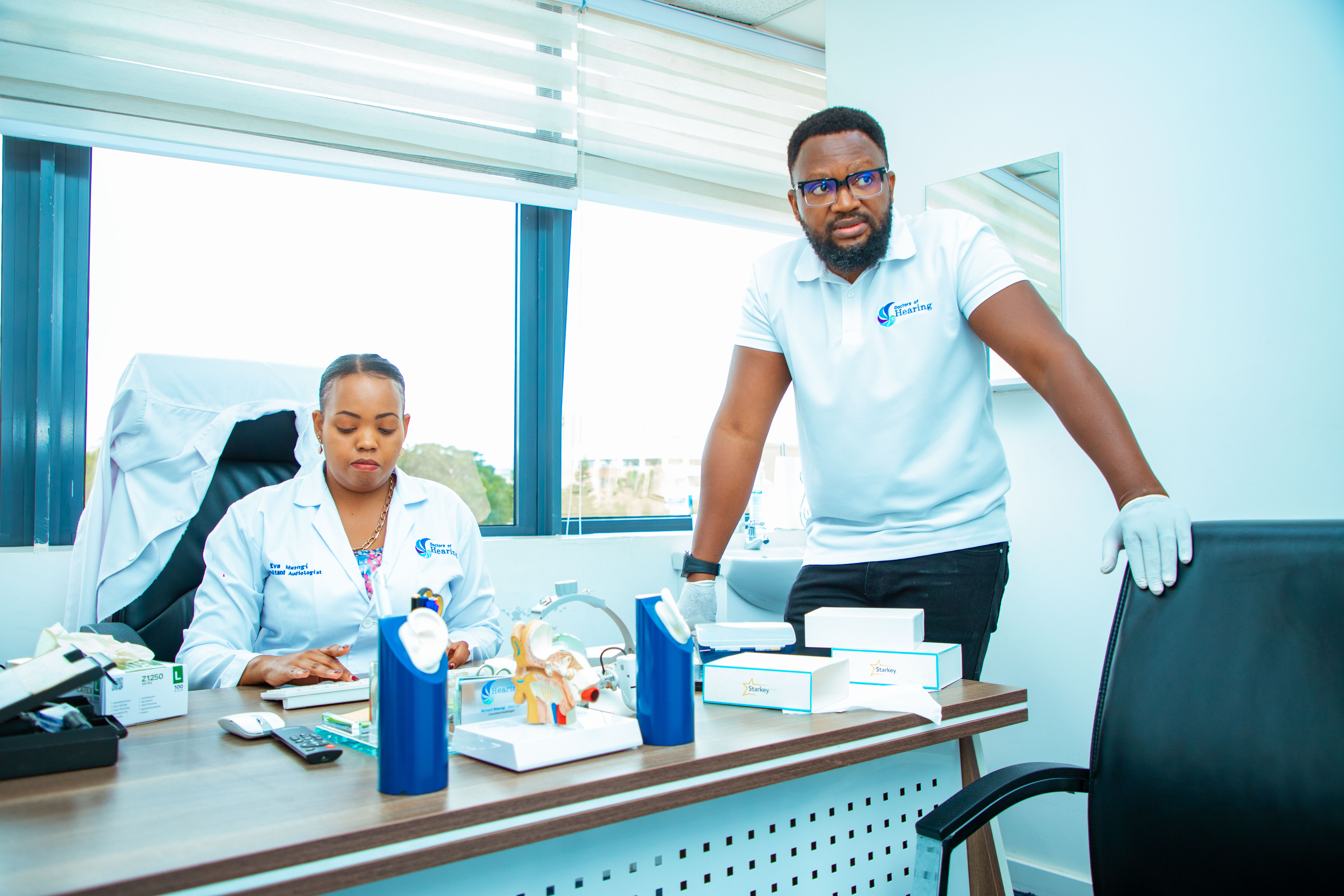 INCUSEAR clinicians preparing a patient care consultation
